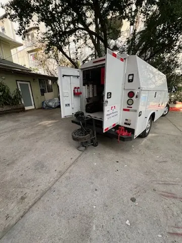 Magnet Plumbing service vehicle on-site for Grease Trap Cleaning in Tarpon Woods